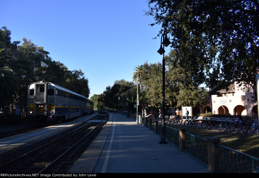Sacramento bound Amtrak Capitol Corridor train arriving into Davis Station
